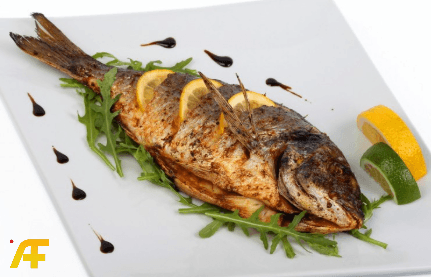 سمك مشوي بالليمون والثوم