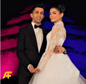 ماذا ارتدى هشام جمال وليلى زاهر في حفل الزفاف؟